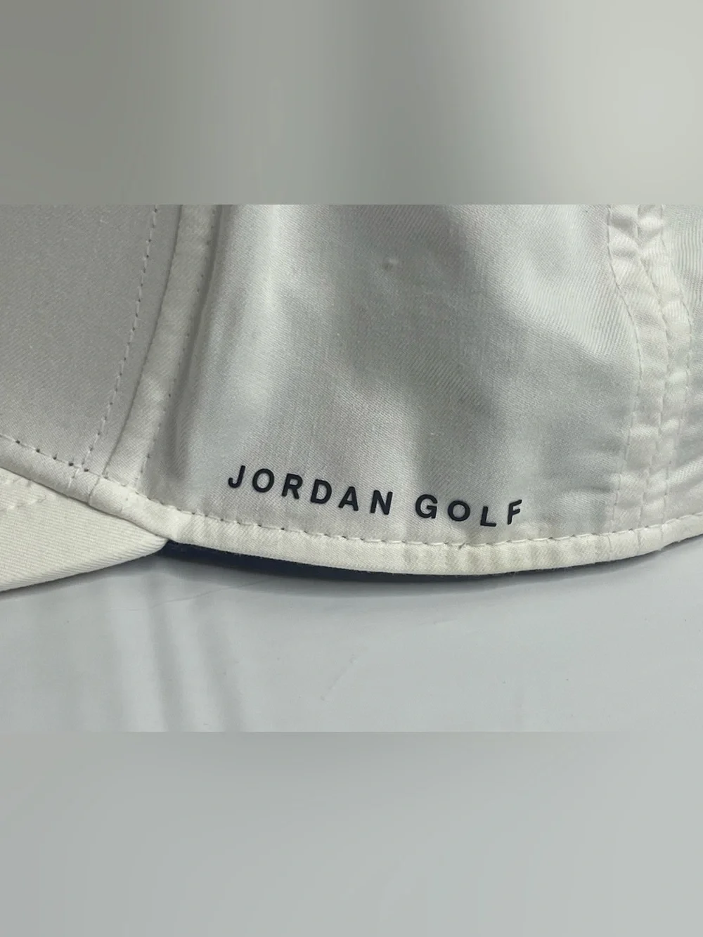 White Jordan Golf Dri-Fit adjustable SnapBack Cap with Black Jumpman Logo